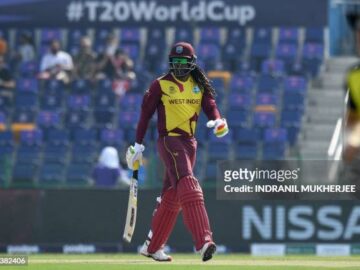 Chris Gayle The Universe Boss entering the field for his last international game